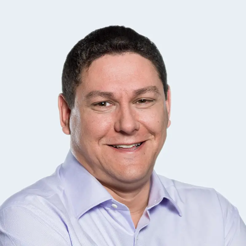 A headshot of Mike Racic, General Manager of RainBarrel.